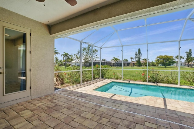 7505 Carissa, Punta Gorda, FL 33955 - swimming pool with a patio area, a ceiling fan, and glass enclosure
