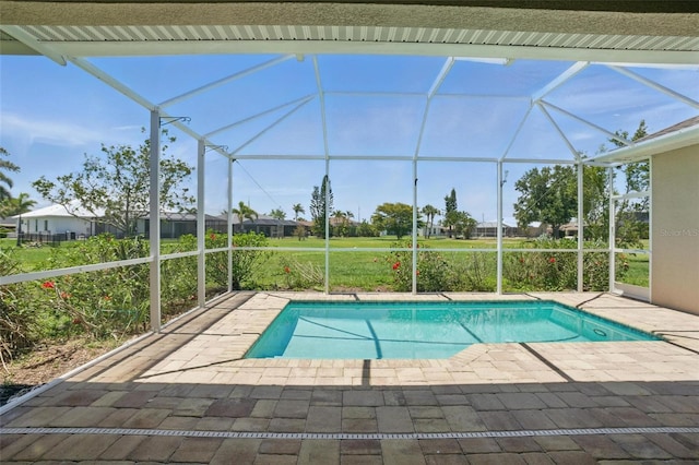 7505 Carissa, Punta Gorda, FL 33955 - outdoor pool featuring glass enclosure and a patio area