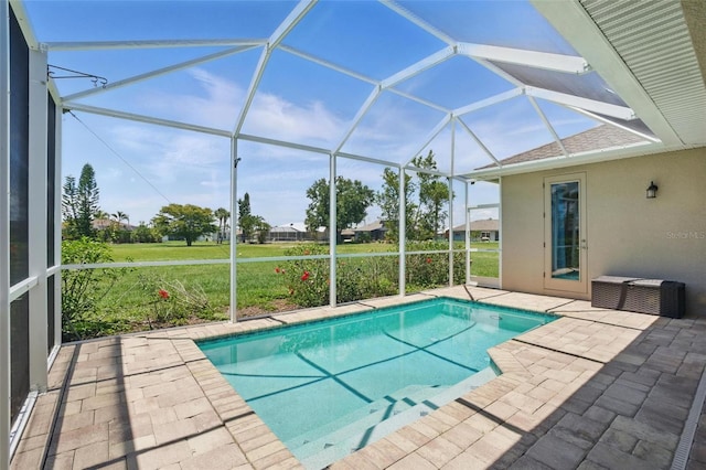 7505 Carissa, Punta Gorda, FL 33955 - outdoor pool featuring a patio and glass enclosure