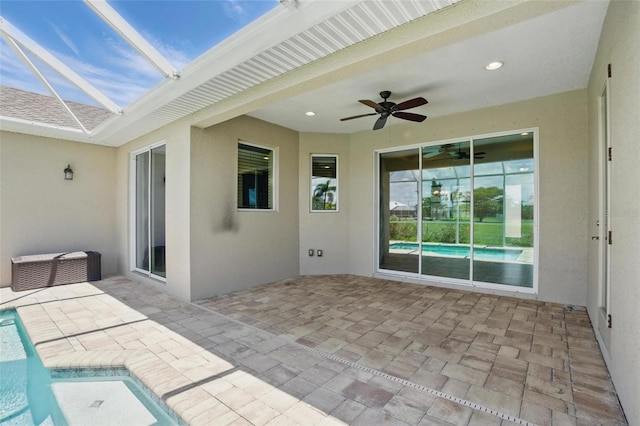 7505 Carissa, Punta Gorda, FL 33955 - view of patio / terrace with ceiling fan and an outdoor pool