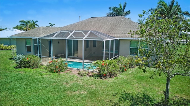 7505 Carissa, Punta Gorda, FL 33955 - back of house featuring stucco siding, an outdoor pool, a lawn, a patio area, and a lanai