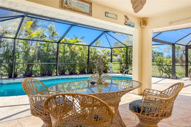 279 Mariner Ln, Rotonda West, FL 33947 - outdoor pool featuring glass enclosure and a patio