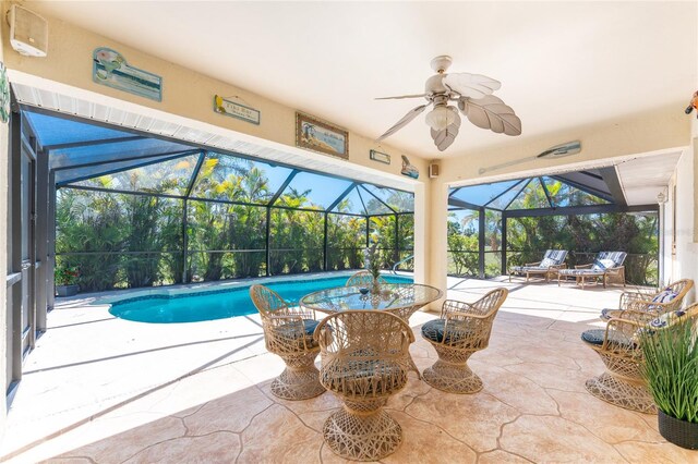 279 Mariner Ln, Rotonda West, FL 33947 - swimming pool with a patio, ceiling fan, and a lanai