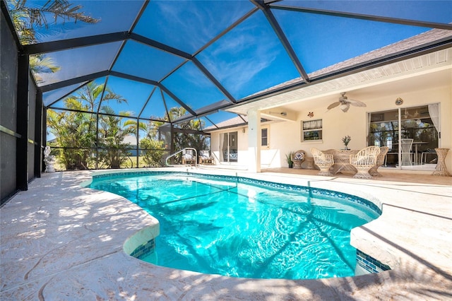 279 Mariner Ln, Rotonda West, FL 33947 - swimming pool with a patio, a ceiling fan, and a lanai