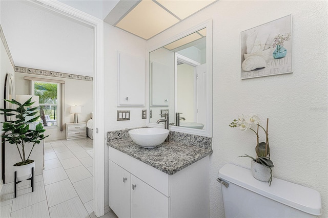 279 Mariner Ln, Rotonda West, FL 33947 - bathroom featuring vanity, toilet, and tile patterned flooring