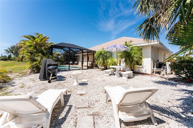 279 Mariner Ln, Rotonda West, FL 33947 - view of yard with an outdoor pool, a lanai, and a patio area