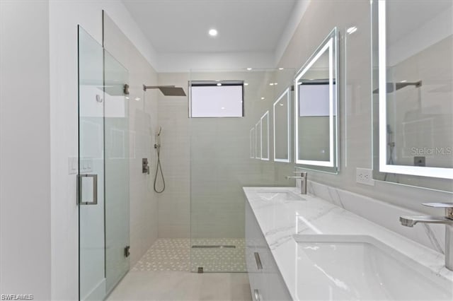 731 Colyer St E, Lehigh Acres, FL 33974 - bathroom featuring a shower stall, double vanity, and recessed lighting