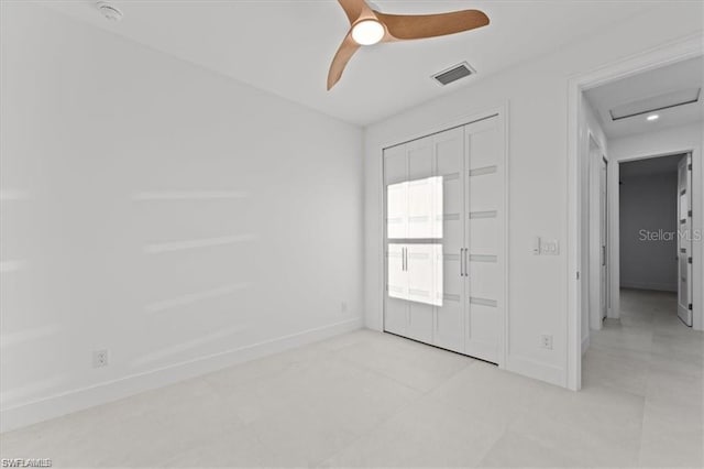 731 Colyer St E, Lehigh Acres, FL 33974 - unfurnished bedroom featuring baseboards, ceiling fan, a closet, and light tile patterned floors