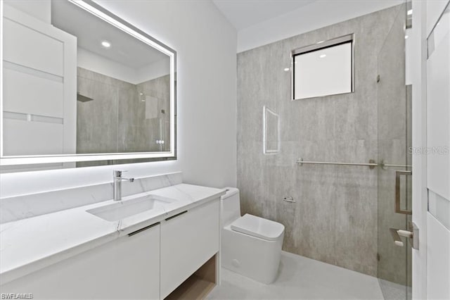 731 Colyer St E, Lehigh Acres, FL 33974 - bathroom featuring a shower stall, toilet, and vanity