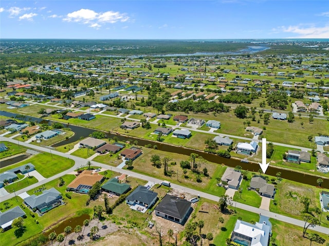 aerial overview of property's location featuring nearby suburban area