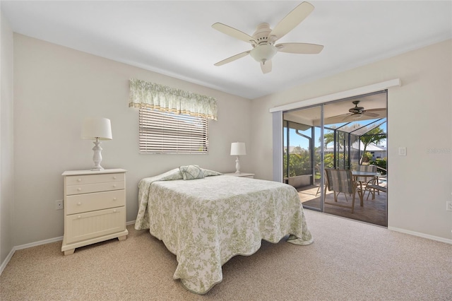 bedroom with access to exterior, light colored carpet, and baseboards