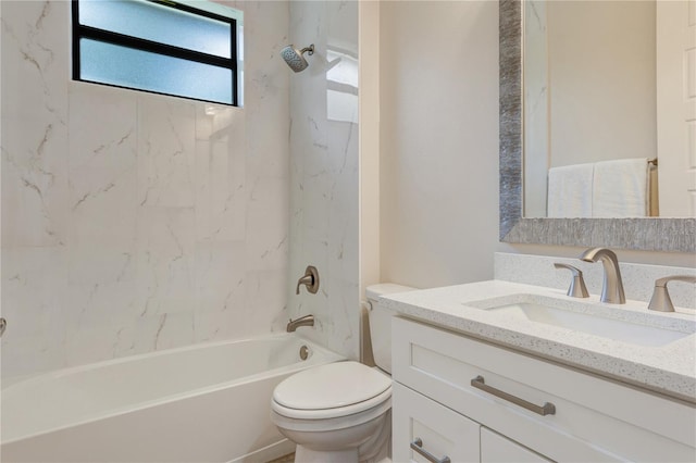 bathroom featuring toilet, shower / bath combination, and vanity