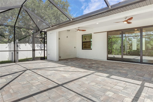 unfurnished sunroom featuring vaulted ceiling