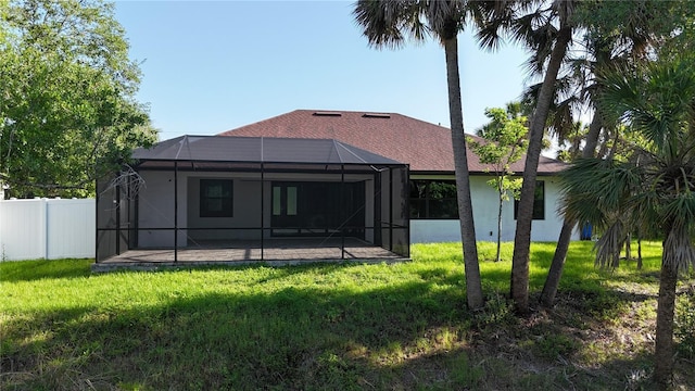 back of property featuring a patio, stucco siding, and a lanai