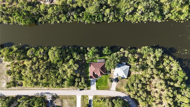 aerial overview of property's location featuring a nearby body of water