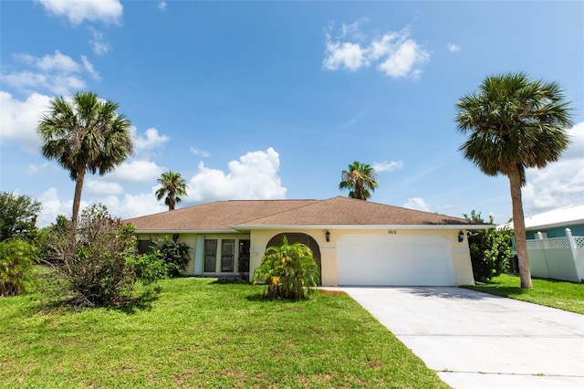1612 Blue Lake Cir, Punta Gorda, FL 33983 - single story home featuring a garage, concrete driveway, and stucco siding