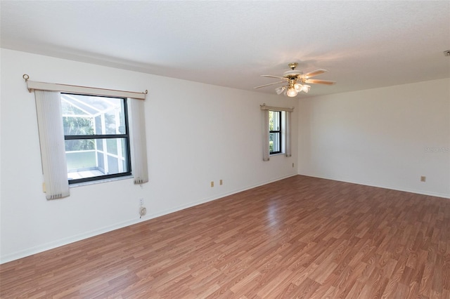 1612 Blue Lake Cir, Punta Gorda, FL 33983 - unfurnished room featuring light wood finished floors and a ceiling fan