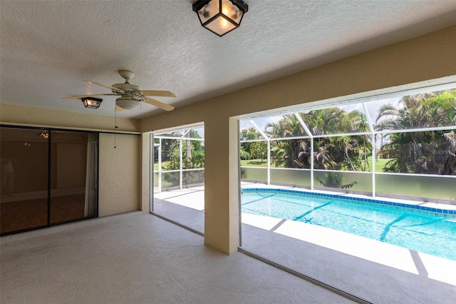 1612 Blue Lake Cir, Punta Gorda, FL 33983 - outdoor pool with a patio, ceiling fan, and glass enclosure