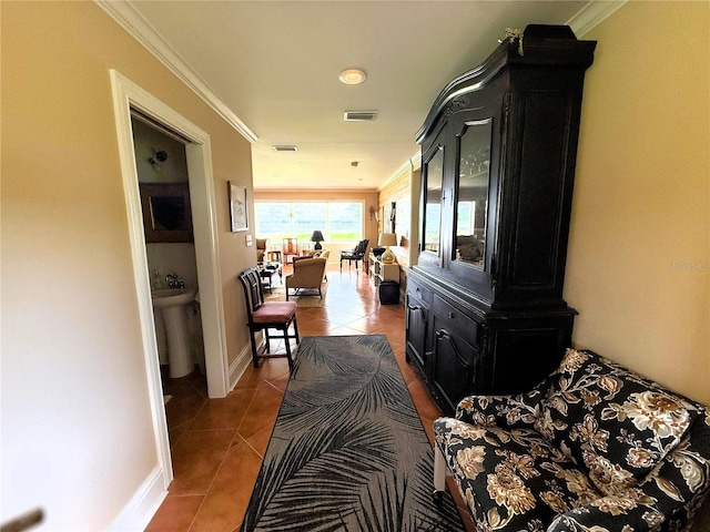 1005 S Sands Paradise Pt, Inverness, FL 34450 - corridor featuring tile patterned floors, crown molding, and baseboards