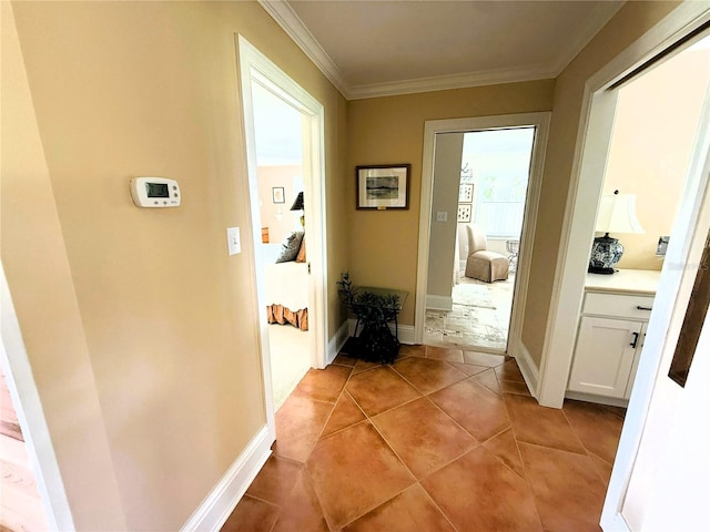 1005 S Sands Paradise Pt, Inverness, FL 34450 - hallway with crown molding, light tile patterned floors, and baseboards