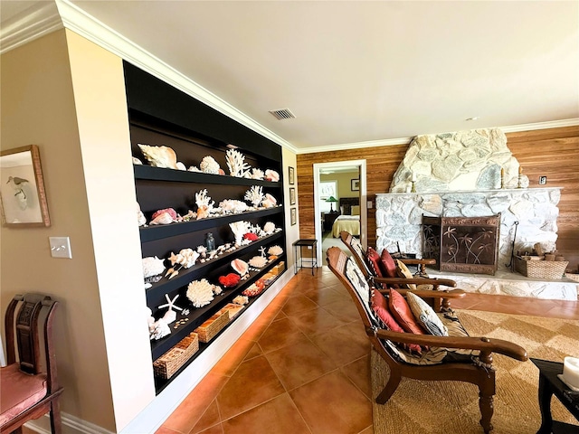 1005 S Sands Paradise Pt, Inverness, FL 34450 - tiled dining area featuring crown molding and a stone fireplace