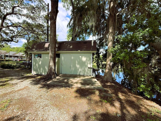 1005 S Sands Paradise Pt, Inverness, FL 34450 - garage featuring a storage shed