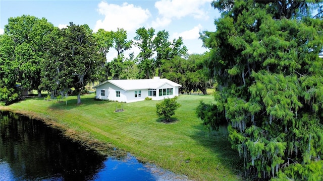 1005 S Sands Paradise Pt, Inverness, FL 34450 - aerial view of property and surrounding area featuring a nearby body of water