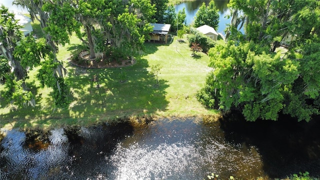 1005 S Sands Paradise Pt, Inverness, FL 34450 - aerial view of property and surrounding area featuring a nearby body of water