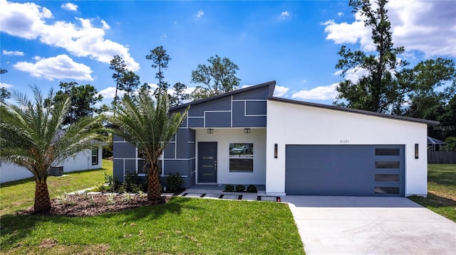 19160 Ruskin Ave, Port Charlotte, FL 33954 - modern home with driveway, stucco siding, a garage, a front yard, and central AC