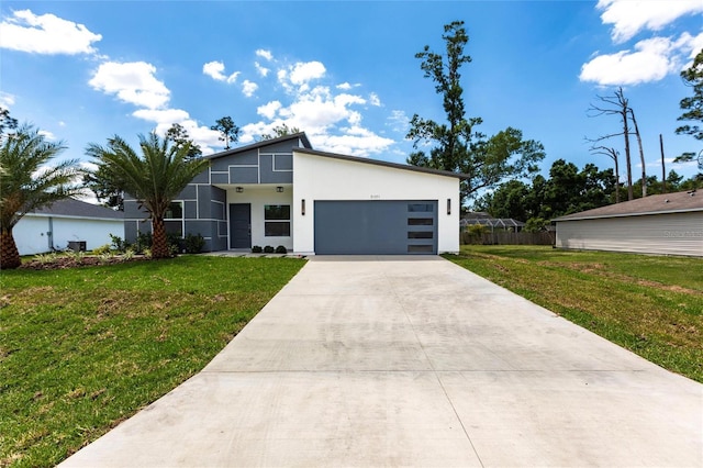 19160 Ruskin Ave, Port Charlotte, FL 33954 - view of front of home featuring driveway, a garage, a front lawn, and stucco siding