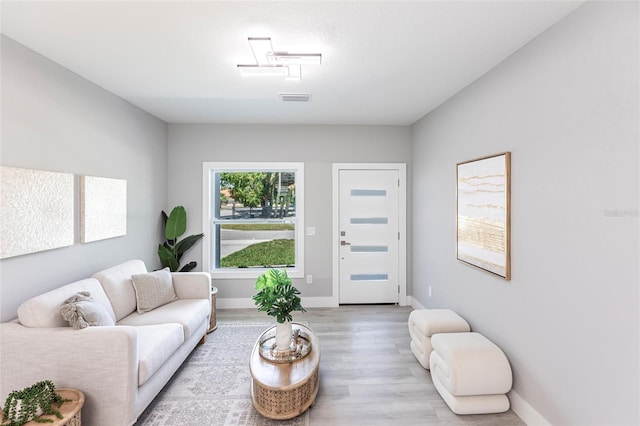 19160 Ruskin Ave, Port Charlotte, FL 33954 - living area with wood finished floors and baseboards
