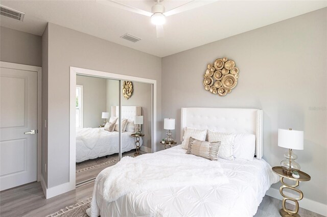 19160 Ruskin Ave, Port Charlotte, FL 33954 - bedroom featuring wood finished floors, baseboards, a closet, and ceiling fan