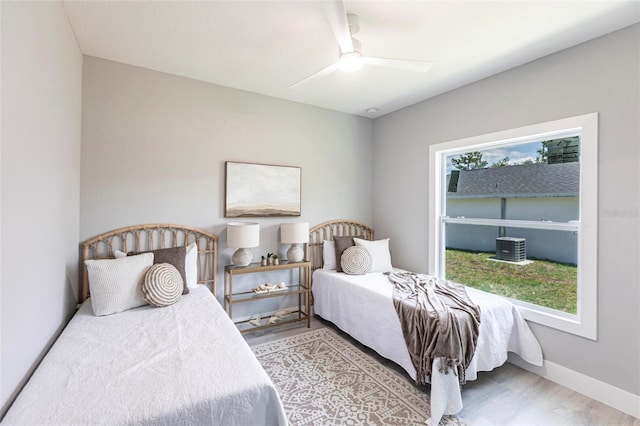 19160 Ruskin Ave, Port Charlotte, FL 33954 - bedroom with light wood-style floors, baseboards, and a ceiling fan