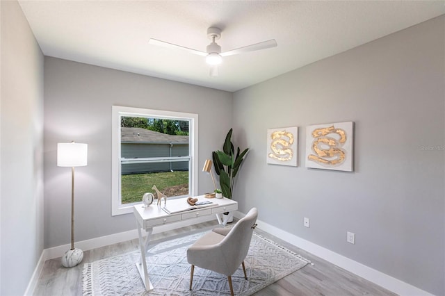 19160 Ruskin Ave, Port Charlotte, FL 33954 - home office with ceiling fan, wood finished floors, and baseboards