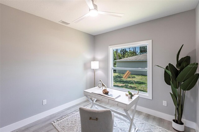 19160 Ruskin Ave, Port Charlotte, FL 33954 - office space with a ceiling fan, baseboards, and light wood finished floors