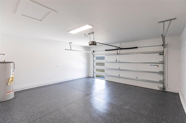 19160 Ruskin Ave, Port Charlotte, FL 33954 - garage with gas water heater, a garage door opener, and baseboards