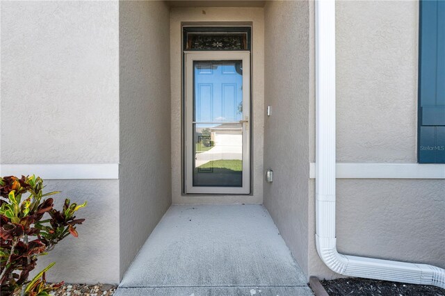 25312 E Lenox Cir, Punta Gorda, FL 33950 - entrance to property with stucco siding