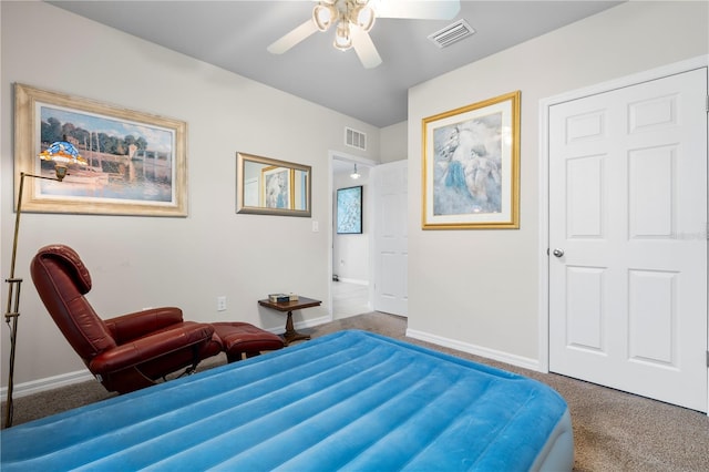 25312 E Lenox Cir, Punta Gorda, FL 33950 - bedroom with carpet flooring, a ceiling fan, and baseboards
