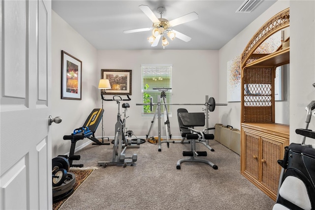 25312 E Lenox Cir, Punta Gorda, FL 33950 - workout room featuring ceiling fan, baseboards, and carpet floors