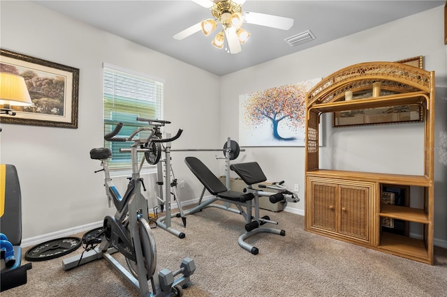 25312 E Lenox Cir, Punta Gorda, FL 33950 - workout room with ceiling fan, baseboards, and carpet flooring