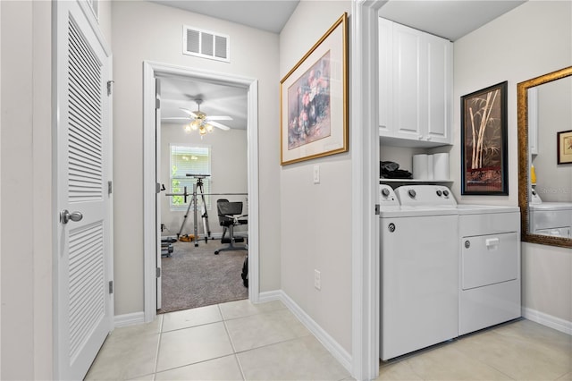 25312 E Lenox Cir, Punta Gorda, FL 33950 - laundry room featuring cabinet space, washer and dryer, ceiling fan, light tile patterned floors, and baseboards