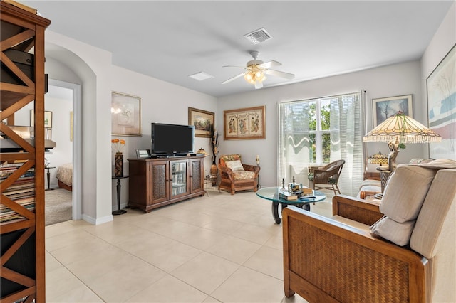 25312 E Lenox Cir, Punta Gorda, FL 33950 - living area with ceiling fan and light tile patterned floors
