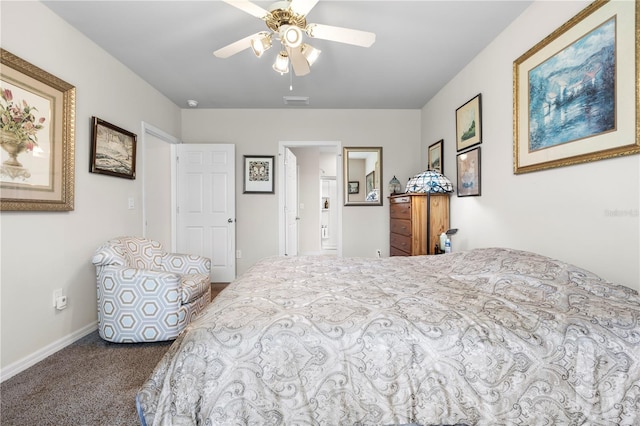 25312 E Lenox Cir, Punta Gorda, FL 33950 - bedroom featuring dark carpet, baseboards, and a ceiling fan