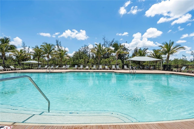 25312 E Lenox Cir, Punta Gorda, FL 33950 - community pool featuring fence and a patio