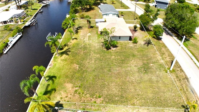 27193AND27197 Voyageur Dr, Punta Gorda, FL 33983 - aerial perspective of suburban area featuring a large body of water and property boundaries highlighted