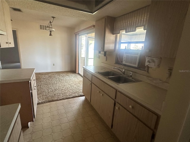 27193AND27197 Voyageur Dr, Punta Gorda, FL 33983 - kitchen with a sink, light countertops, tile patterned floors, and cooling unit