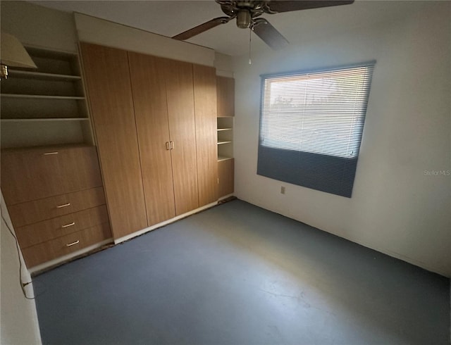 27193AND27197 Voyageur Dr, Punta Gorda, FL 33983 - unfurnished bedroom with concrete floors, a ceiling fan, and a closet