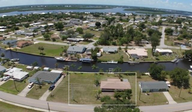 27193AND27197 Voyageur Dr, Punta Gorda, FL 33983 - aerial view of residential area featuring a large body of water