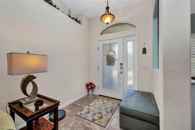 foyer entrance with baseboards