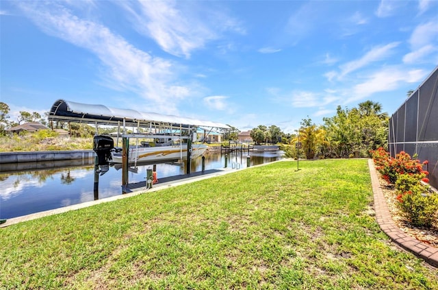 dock with a water view, a lawn, a lanai, and boat lift